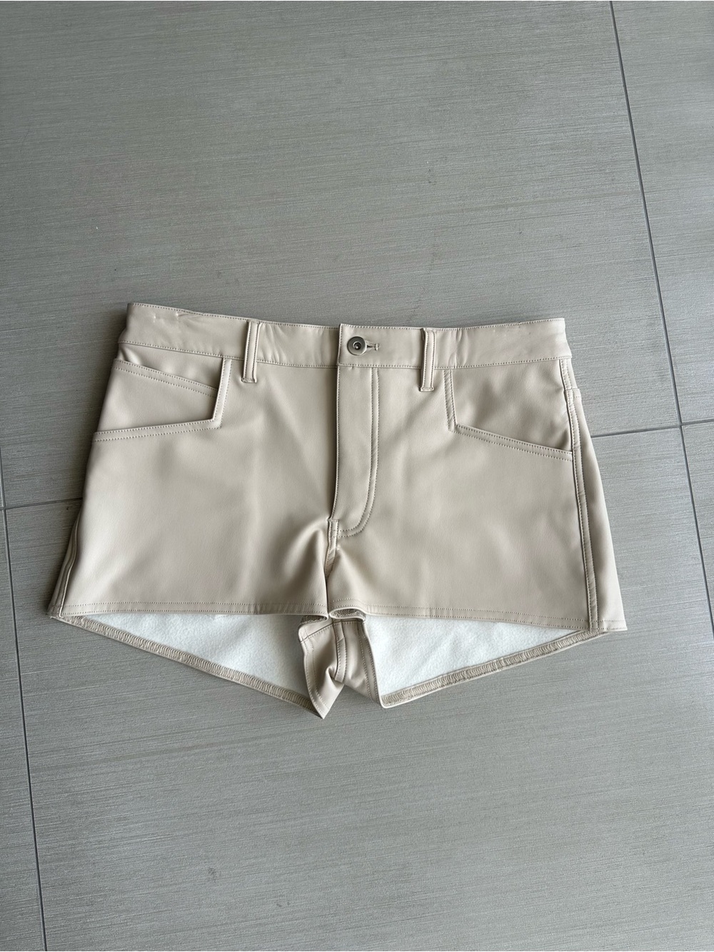 ALIX NYC Faux Leather Shorts in Light Beige